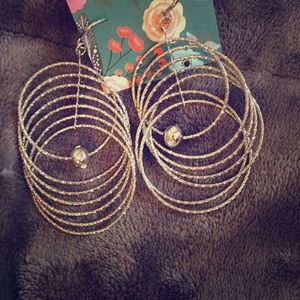 Bangle optical illusion earrings